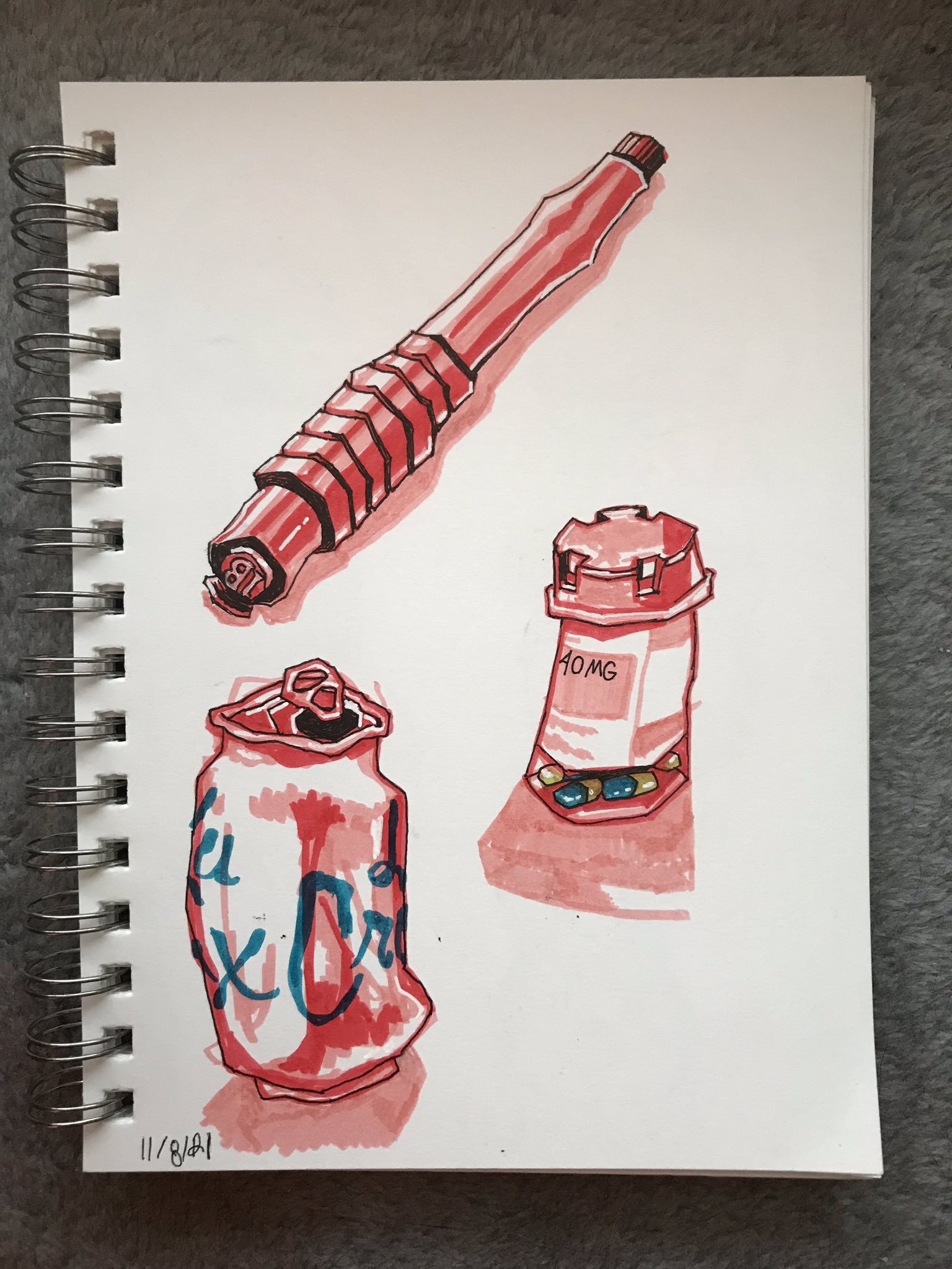 Photo of a sketchbook page showing marker drawings of a pill bottle, La Croix can, and marker