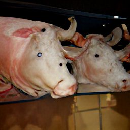 AI generated image of what looks like cows that look hairless or skinned standing in a darkened stable or barn with staring tiny beady eyes