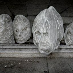 AI generated image of a line of heads wrapped in white plastic trash bags under an overpass