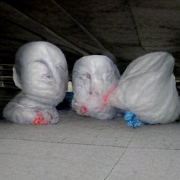 AI generated image of a line of heads wrapped in white plastic trash bags under an overpass