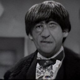 AI generated image of the Second Doctor of Doctor Who. He has a Craggy face and strange Beatles-esque haircut. He has light skin and a slightly baggy, mismatched suit on.