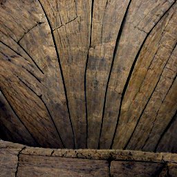 AI generated image of the view into a wood tunnel going straight down