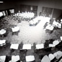 AI generated image of CCTV footage of what looks like a lecture hall at night