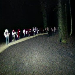 AI generated image of a line of people walking through darkness at night toward the camera