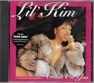 Cover for Lil Kim's Crush on You. Lil Kim looks sultry with short dark hair as she licks ice cream in nothing but a fur coat and gold jewelry